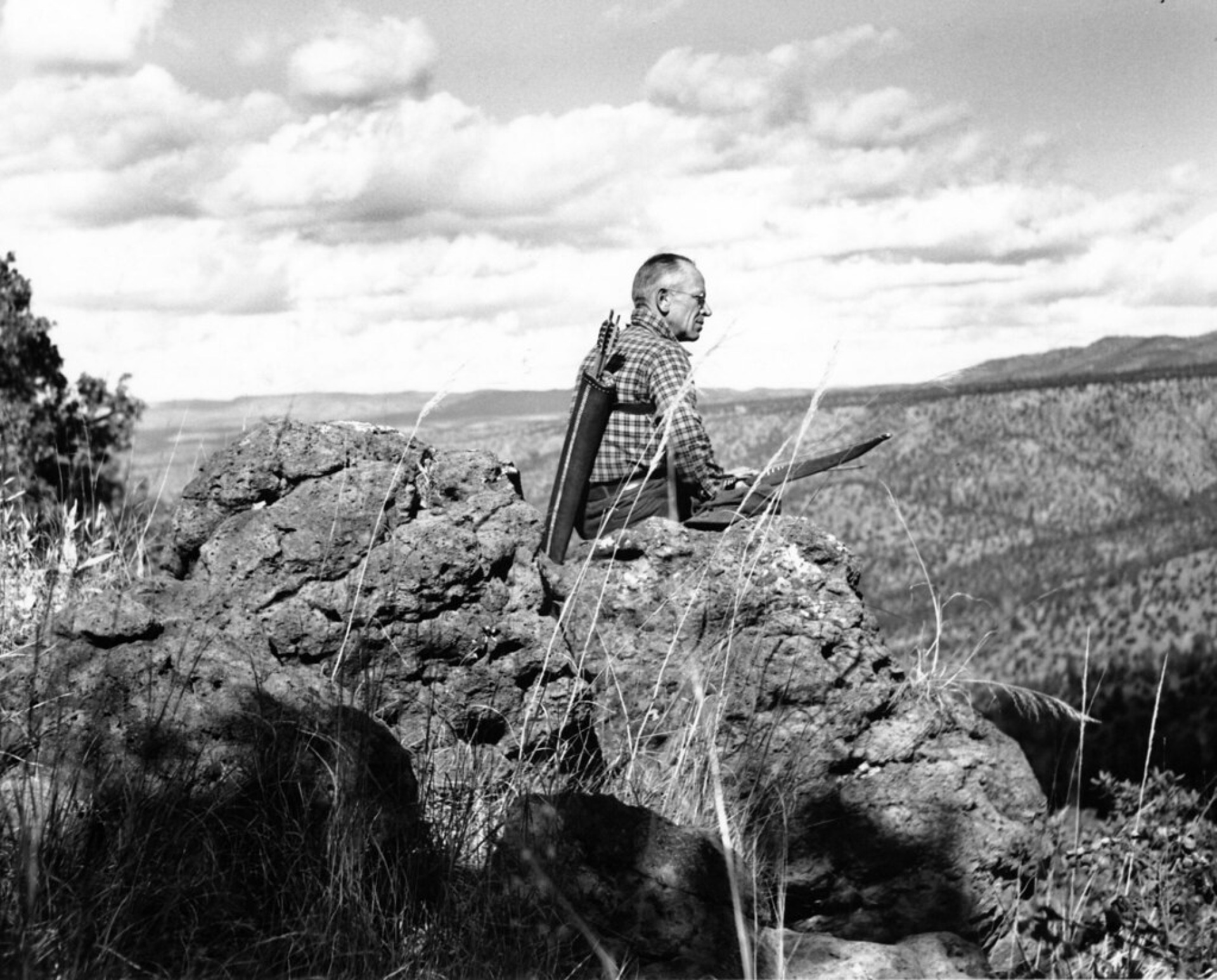Aldo sitting atop a cliff. Source: Pacific Southwest Forest Service, USDA.