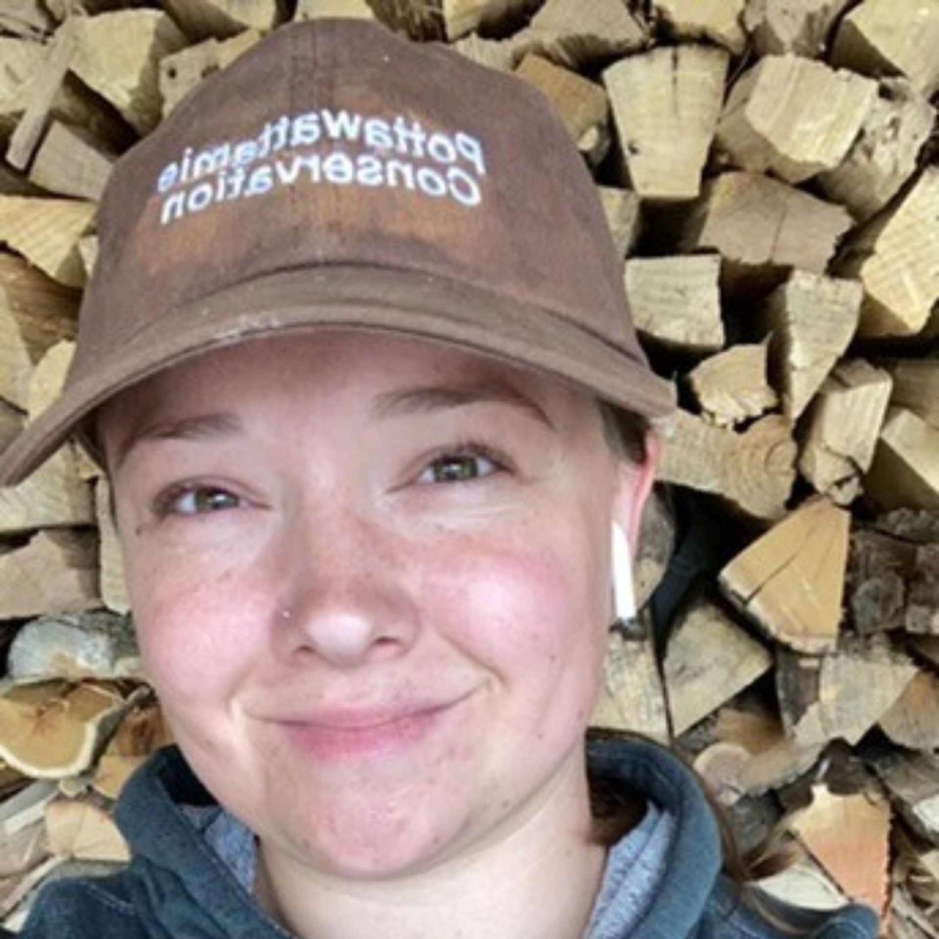Park Ranger Intern chopping firewood for the campground.
